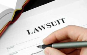 A victim signs an agreement to legal representation